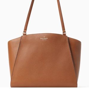 Kate Spade Brim Laptop Tote
COLOR:
Warm Gingerbread